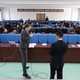 A foreign seminar leader leads a business class in the DPRK.